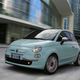 A fiat 500 hatchback in mint green